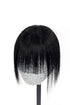 A mannequin head showcasing a dark black human hair topper with bangs.