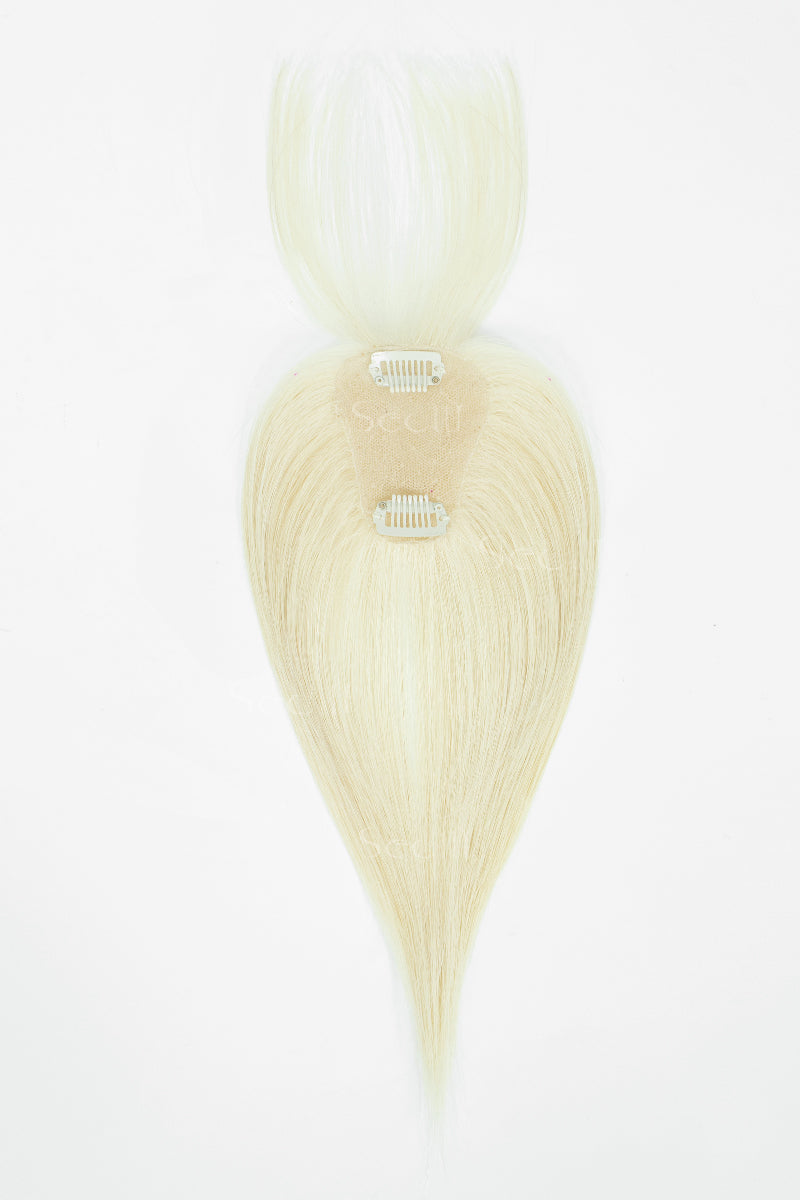 A single light blonde hair extension piece with a tapered tail and two metal clip attachments, shown against a plain white background.