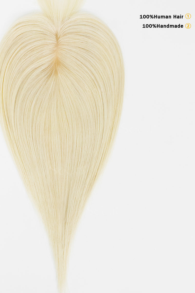 A heart-shaped bundle of straight, light blonde human hair extensions on a plain white background, with text in the top right reading &