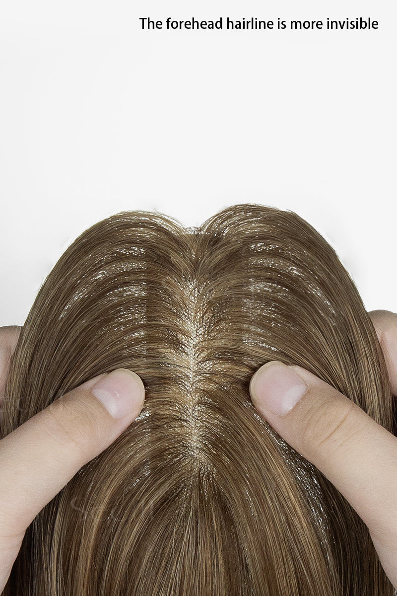 Close-up of a hairline with fingers touching the scalp on a white background