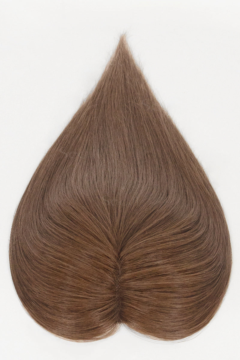 A heart-shaped hair extension or wig piece with straight, medium brown hair, displayed against a solid white background.