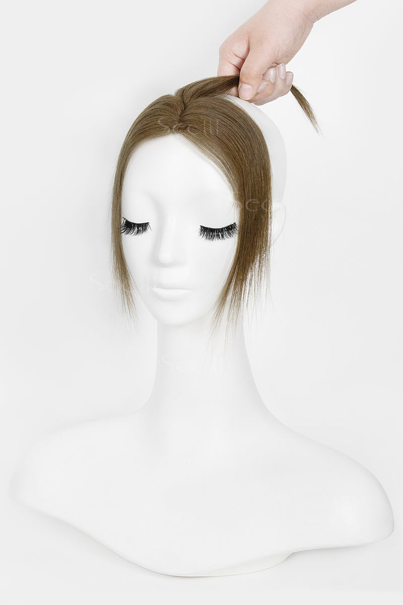 Mannequin head with Magic Pixie Topper Medium Ash Brown