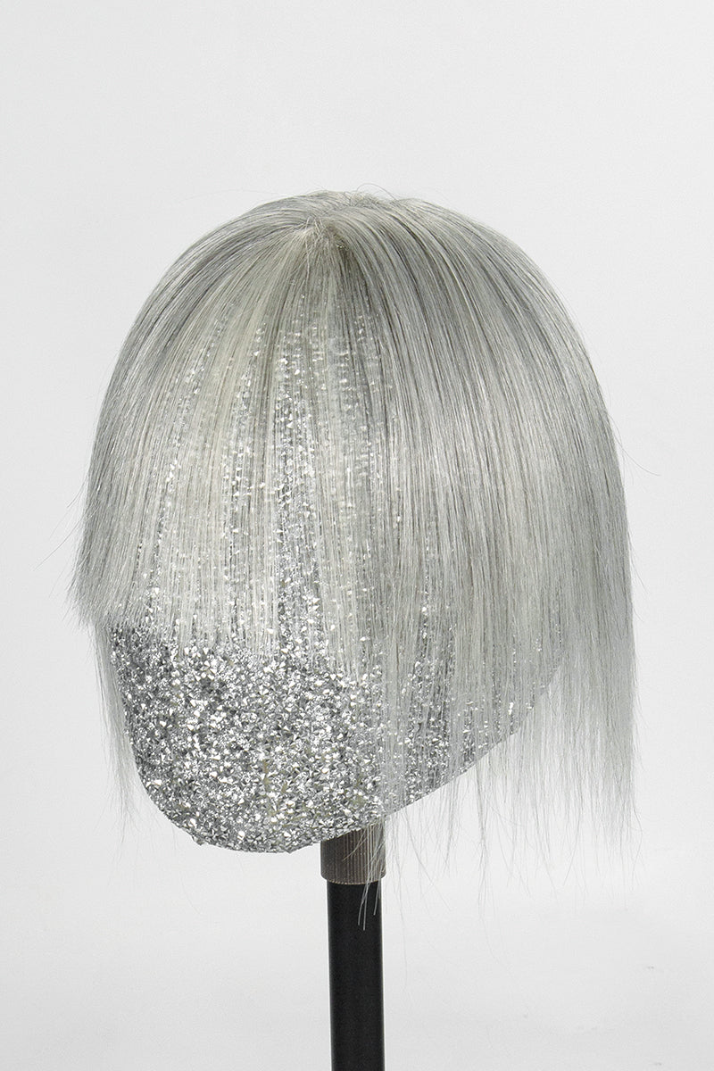 Light Grey topper on a mannequin head against a white background