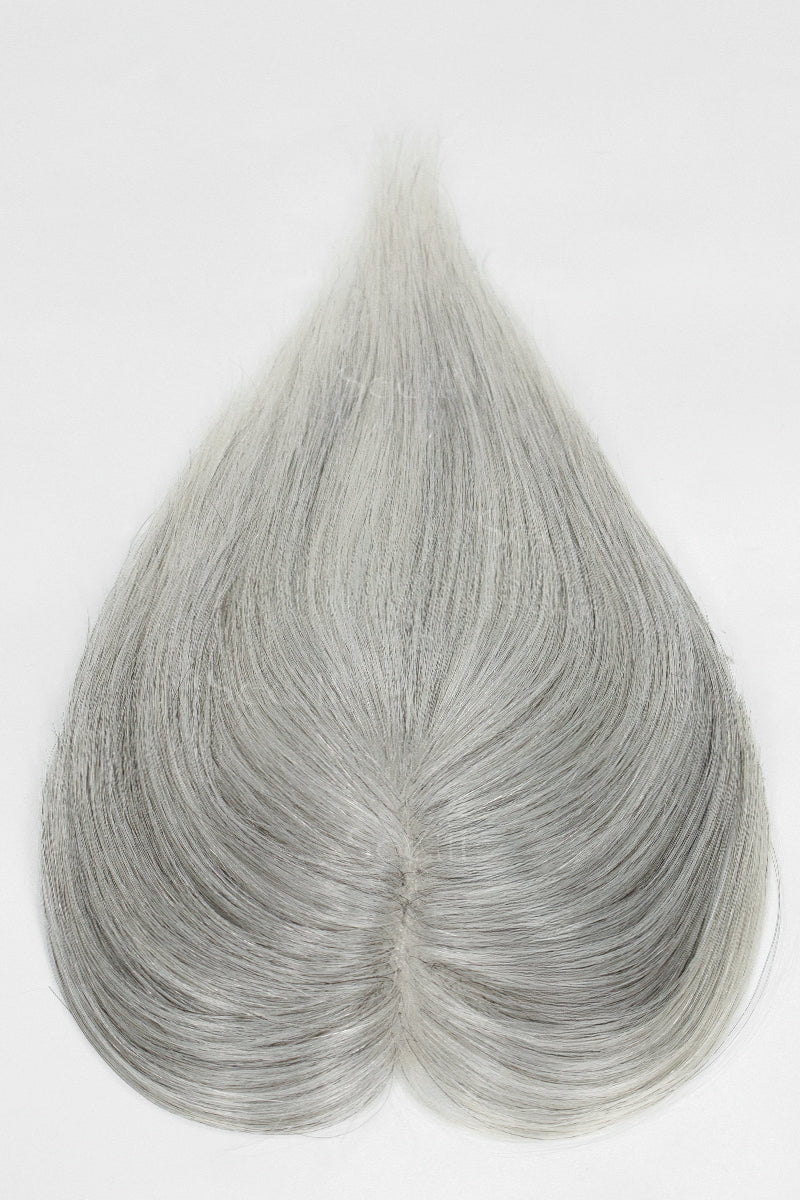 Light Grey hair topper on a white background