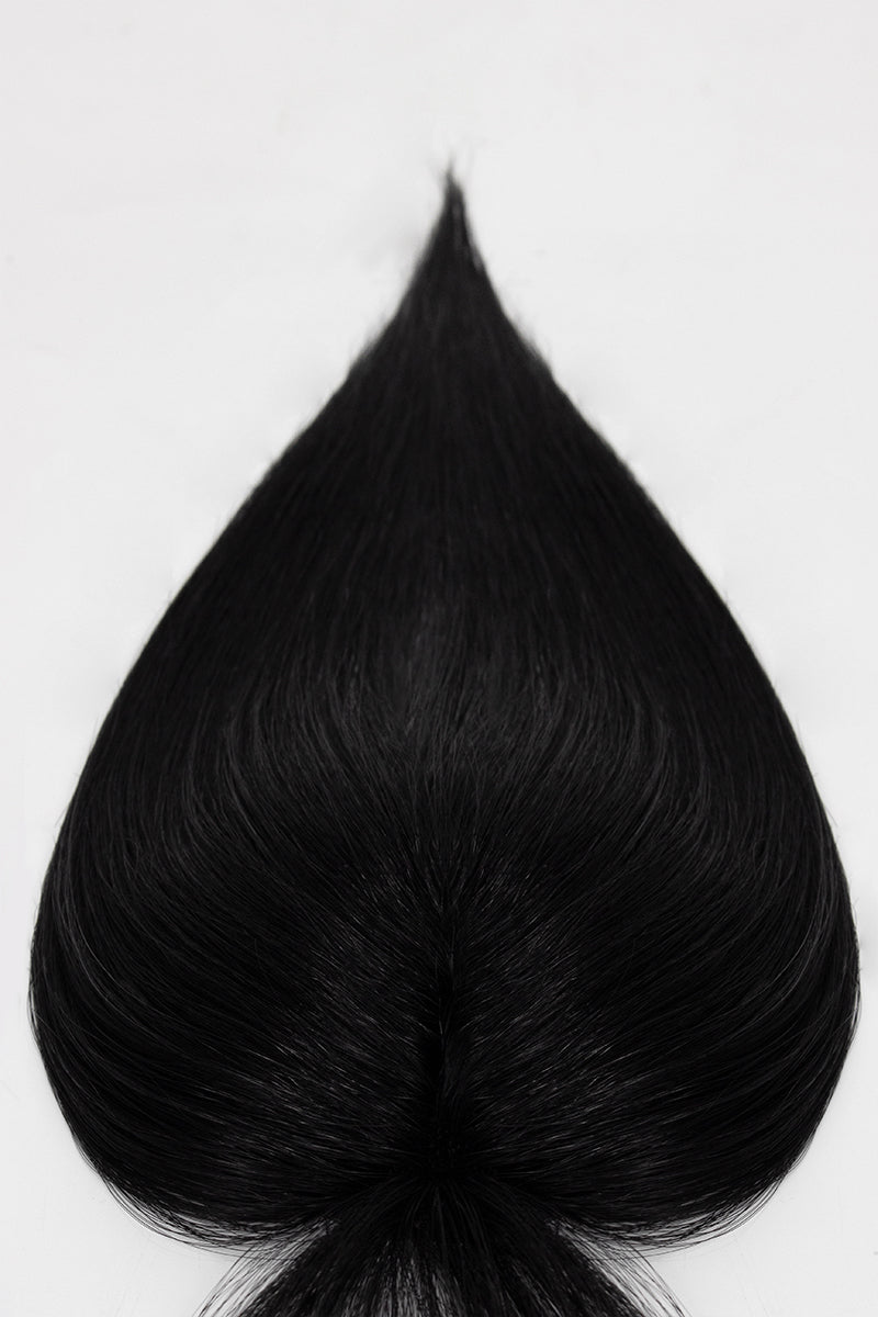 Black hair topper on a white background