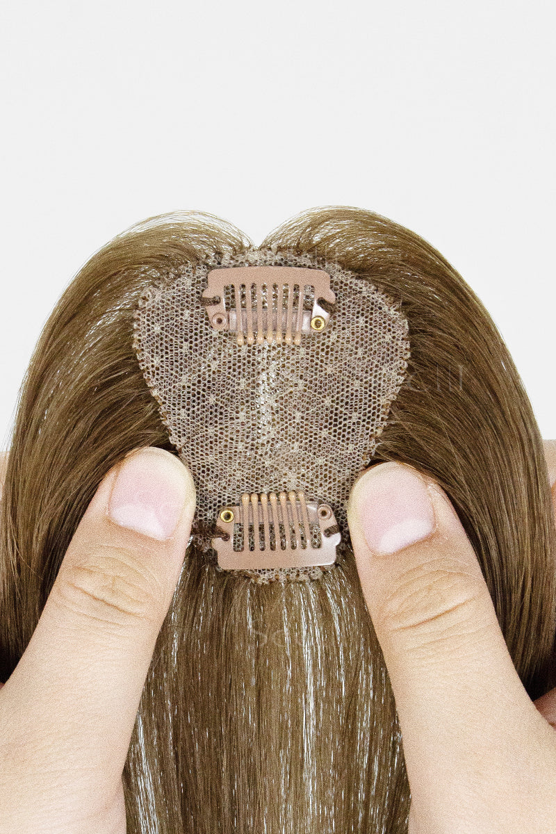 Close-up of a Magic Pixie Topper with Bangs Medium Ash Brown