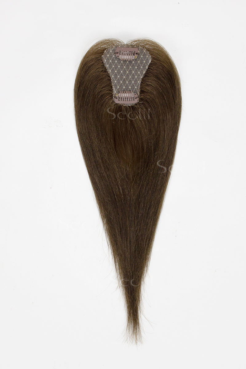 Brown hair topper on a white background