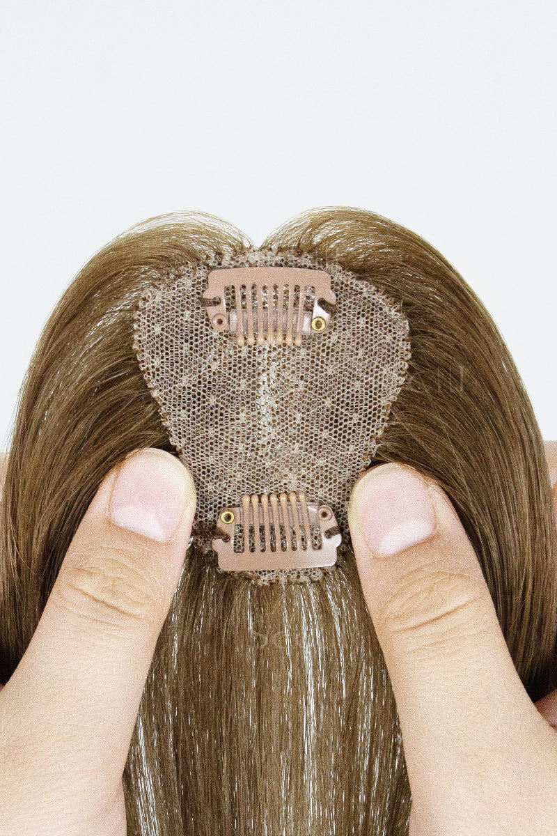 Close-up of a Magic Pixie Topper Medium Ash Brown