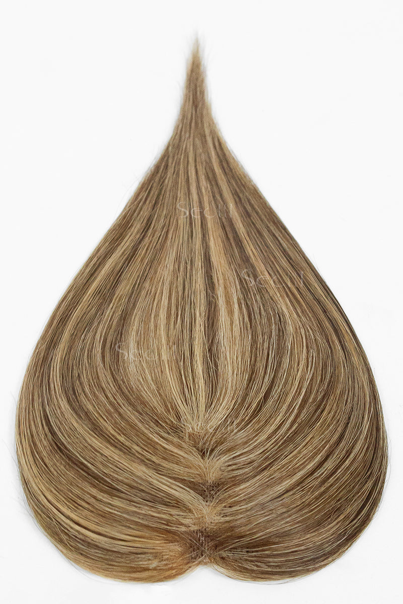 Hair color sample in a teardrop shape with brown and blonde tones on a white background