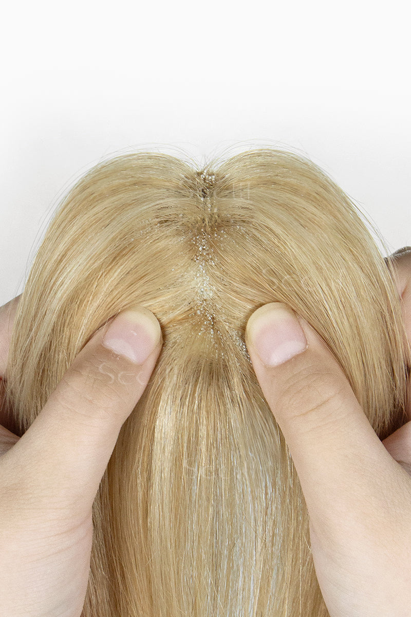 Close-up of a Magic Pixie Topper with Bangs Warm Blonde with Highlight