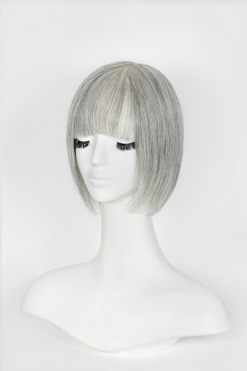 Silver-gray short bob wig with blunt bangs displayed on white mannequin head, front view, light gray background