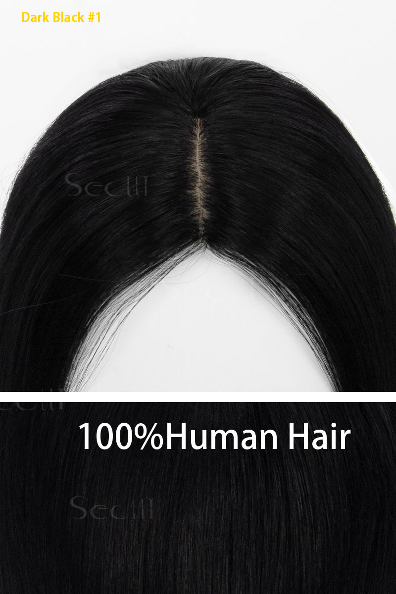 Dark black hairpiece with visible root on a white background, labeled &