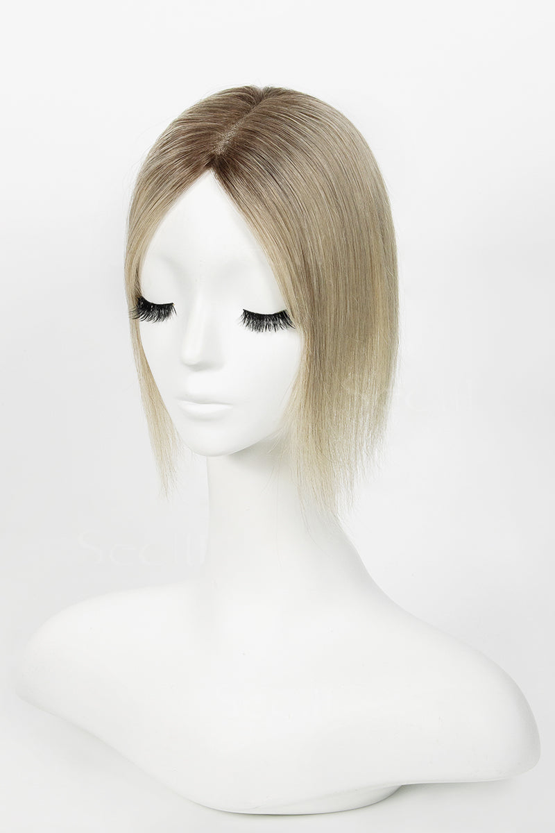 Mannequin head with a Mona Handmade Human Hair Topper Ombre Dark Root to Blonde