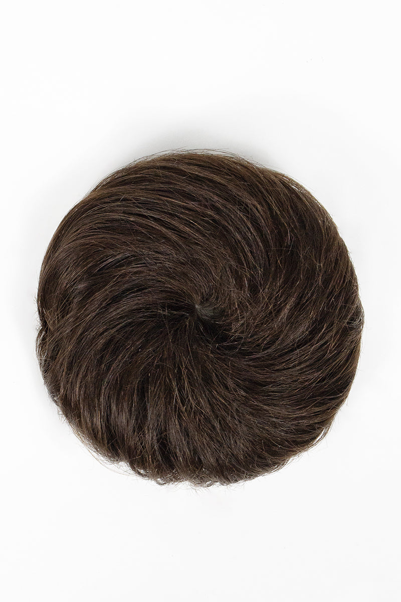 A dark brown hairpiece or hair bun shown from a top-down view on a plain white background.