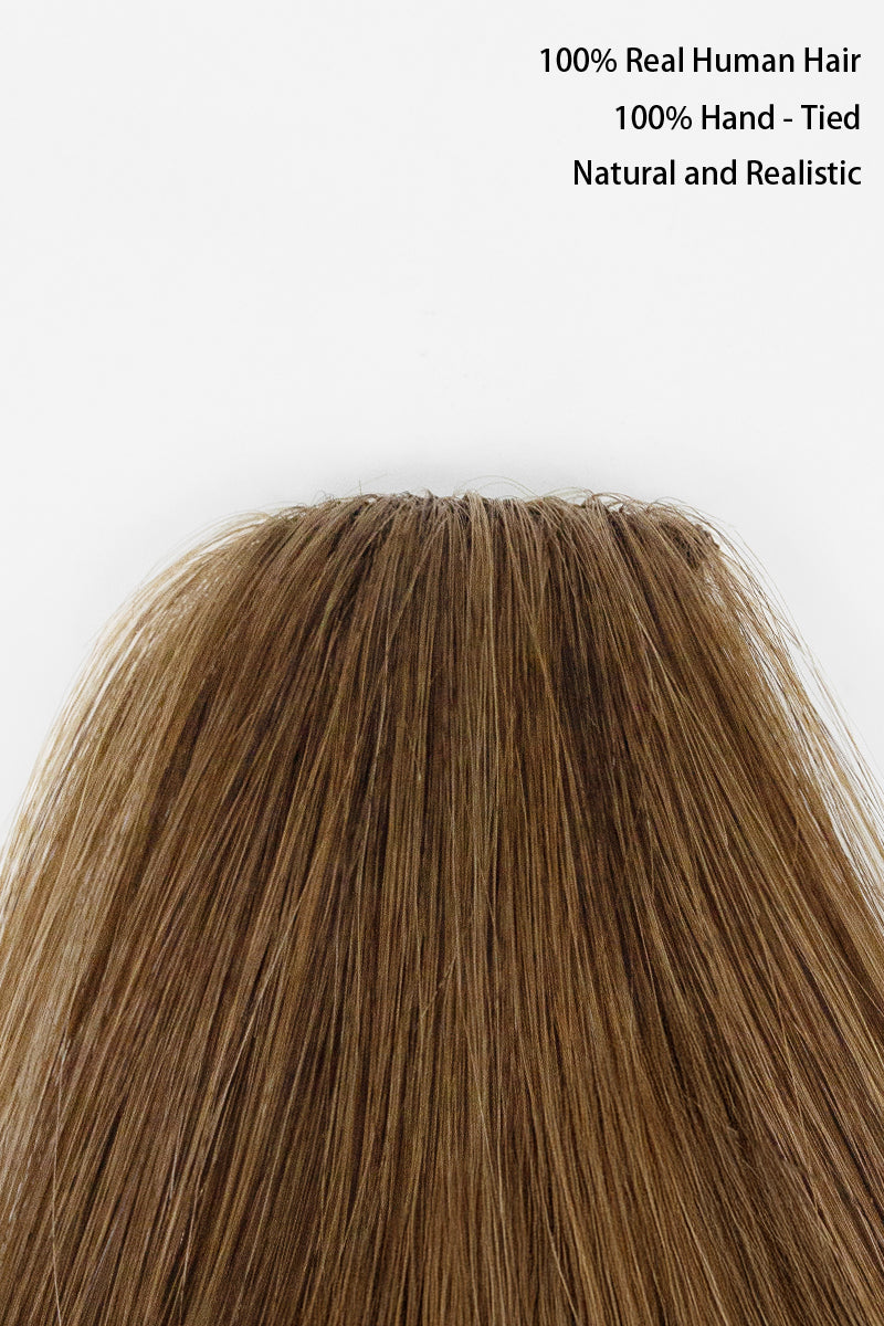 Brown hair extension labeled as 100% real human hair, hand-tied, and natural and realistic.