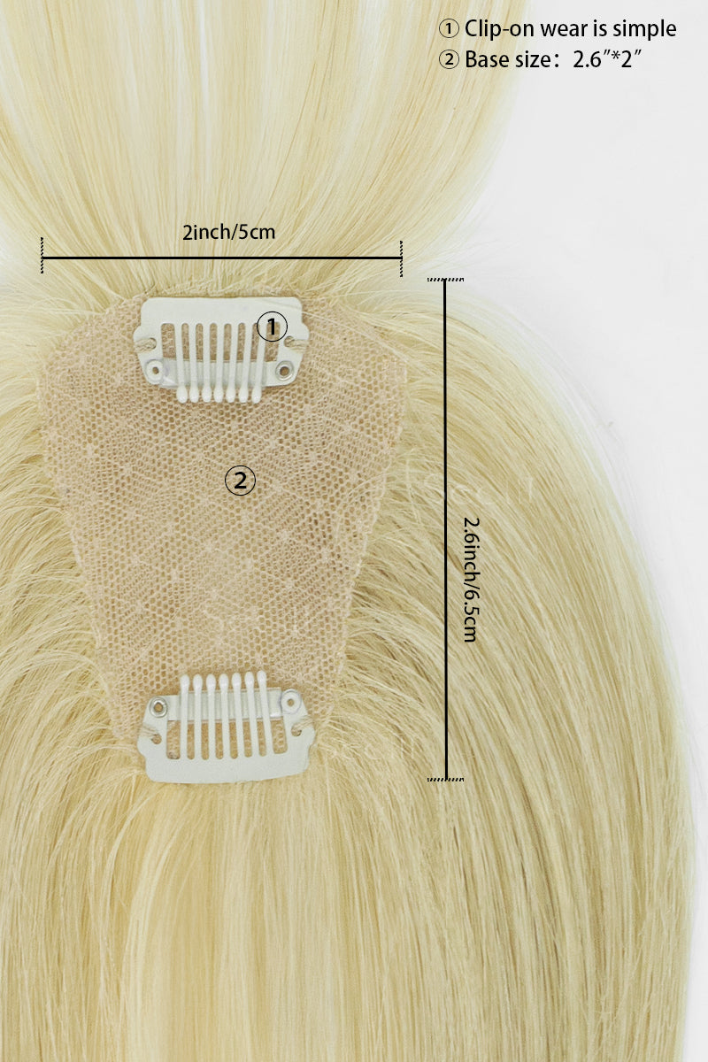 Close-up of a blonde hair clip-in extension with two white clip tabs and a beige mesh base, overlaid with measurement lines and text indicating 2 inch/5 cm width and 2.6 inch/6.