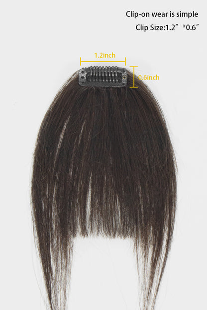 A dark brown clip-on hair extension with a clear adhesive clip, shown against a white background with yellow dimension lines indicating a width of 1.2 inches and height of 0.