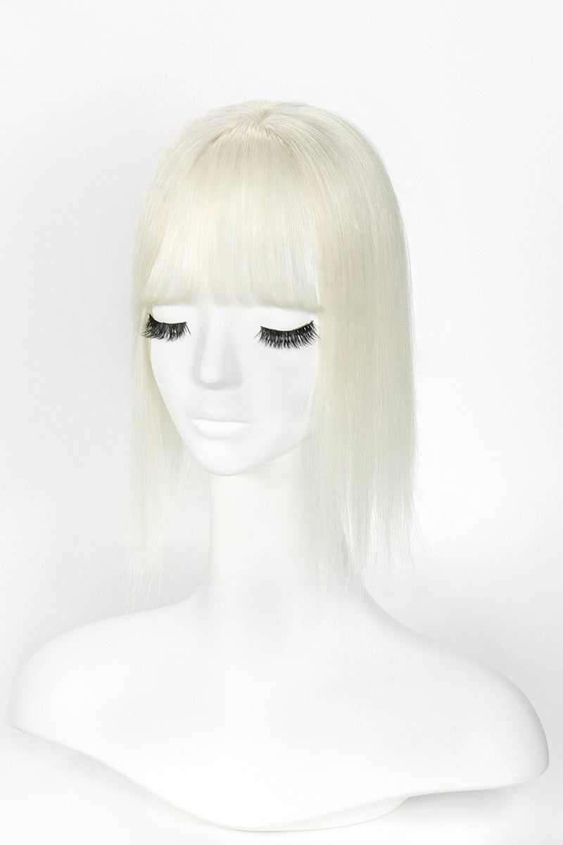 Mannequin head with a blonde wig on a white background