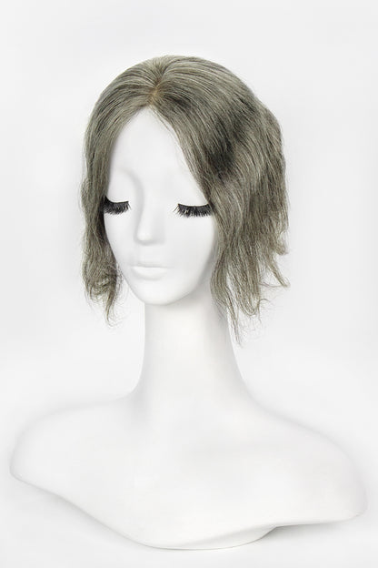 Mannequin head with a Flavia-C02 Wave Curly Human Hair Toppers  