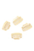 Four beige hair combs on a white background