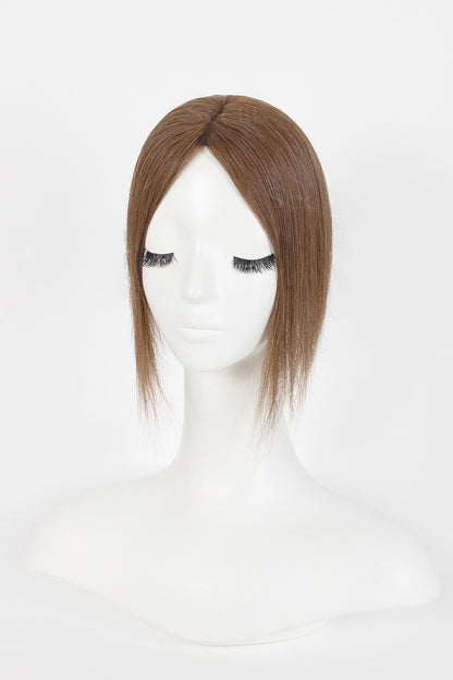 A shoulder-length straight wig with a center part in a medium brown shade, displayed on a white mannequin head against a plain white background.