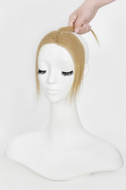 Mannequin head with Magic Pixie Topper Dark Blonde 