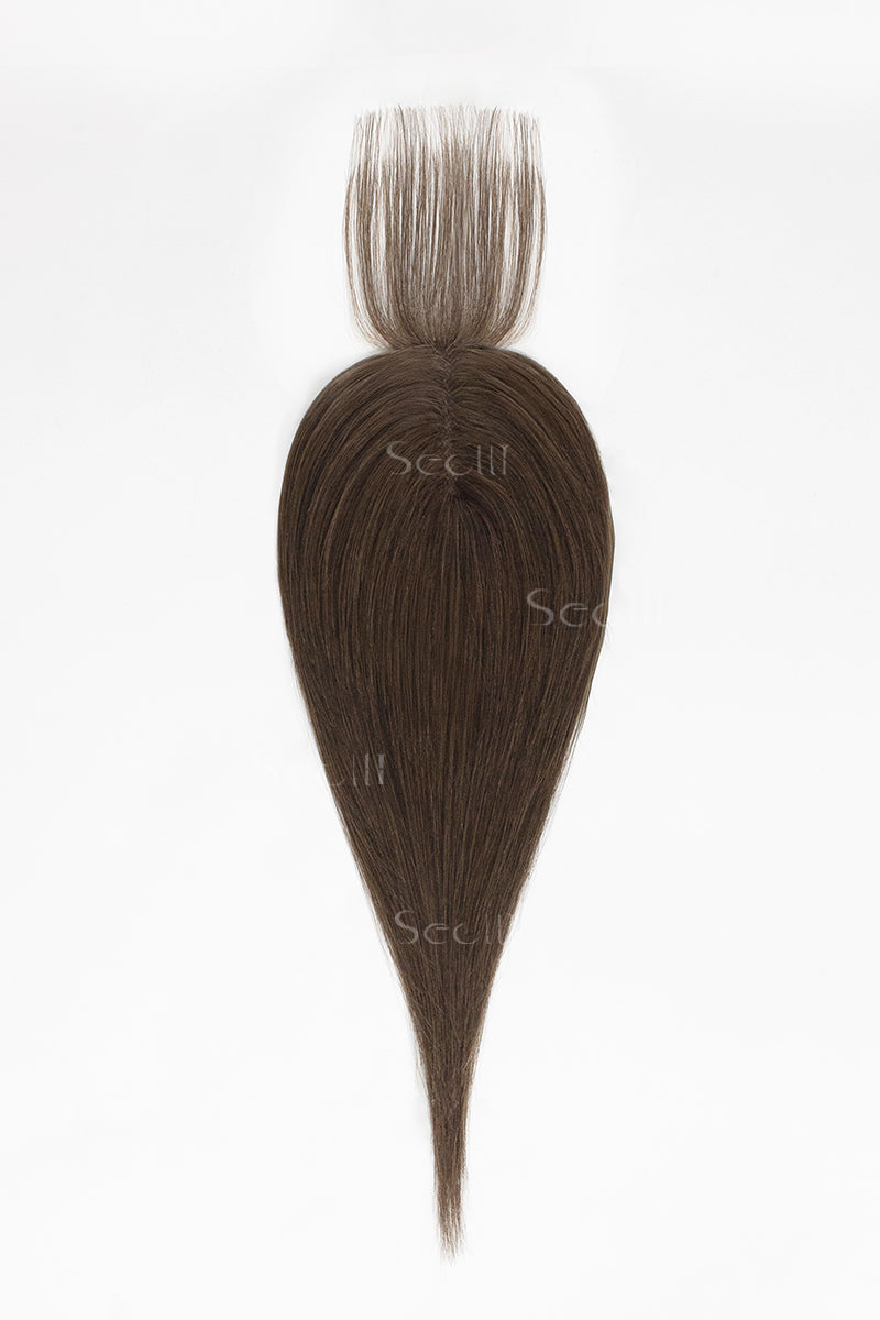 Hair topper with a white comb on a white background