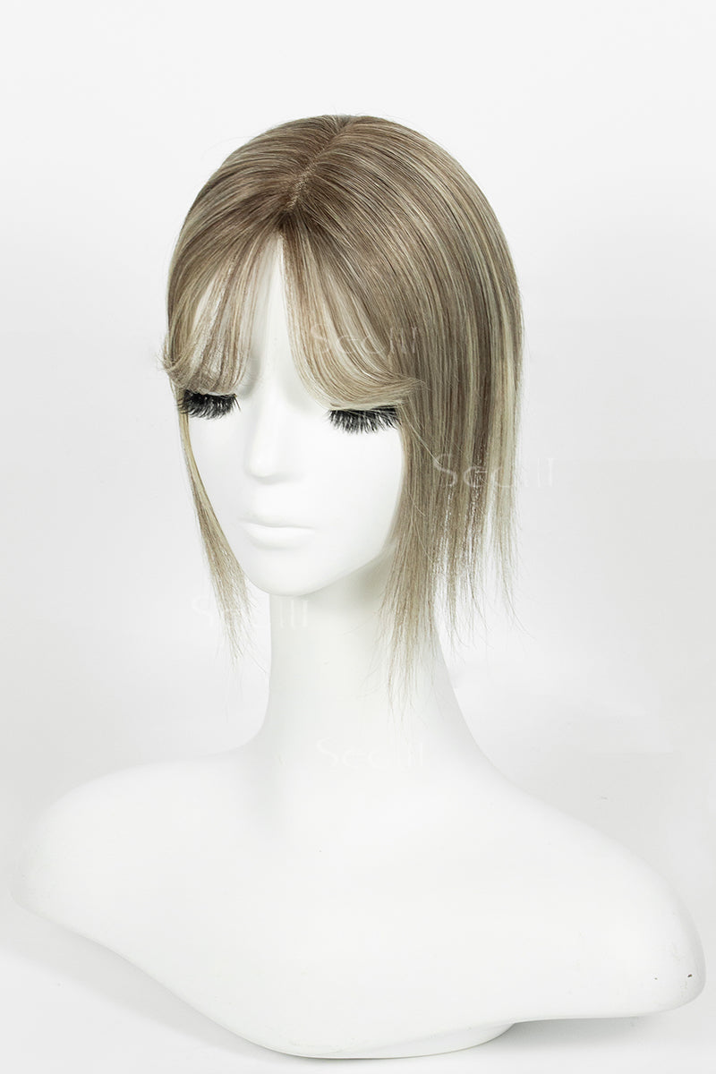 Mona-B human hair topper with bangs in brown blonde with medium brown root side view