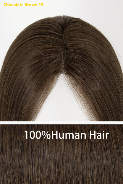 Chocolate brown hairpiece labeled as 100% human hair on a white background