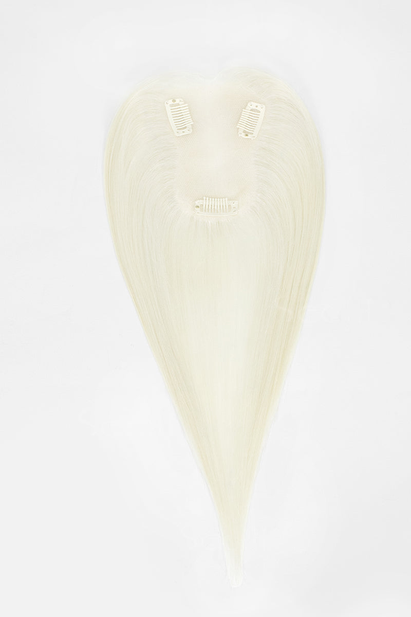 A single heart-shaped hair extension piece with two small clip attachments at the top, shown on a plain white background.