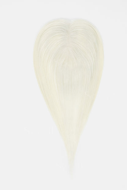 A heart-shaped hair extension or wig piece in a very light platinum blonde color, shown against a plain white background.