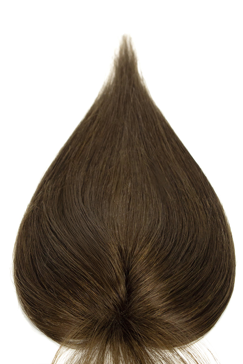 Brown hair topper on a white background