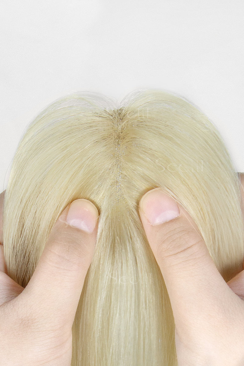 Close-up of a Magic Pixie Topper with Bangs Lightest Blonde 
