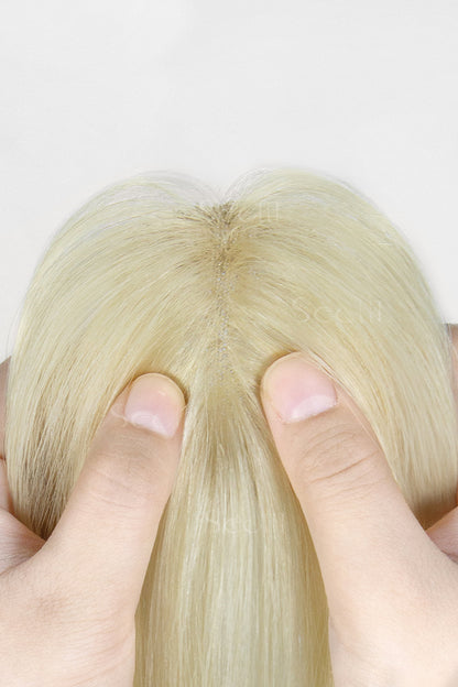Close-up of a Magic Pixie Topper with Bangs Lightest Blonde 