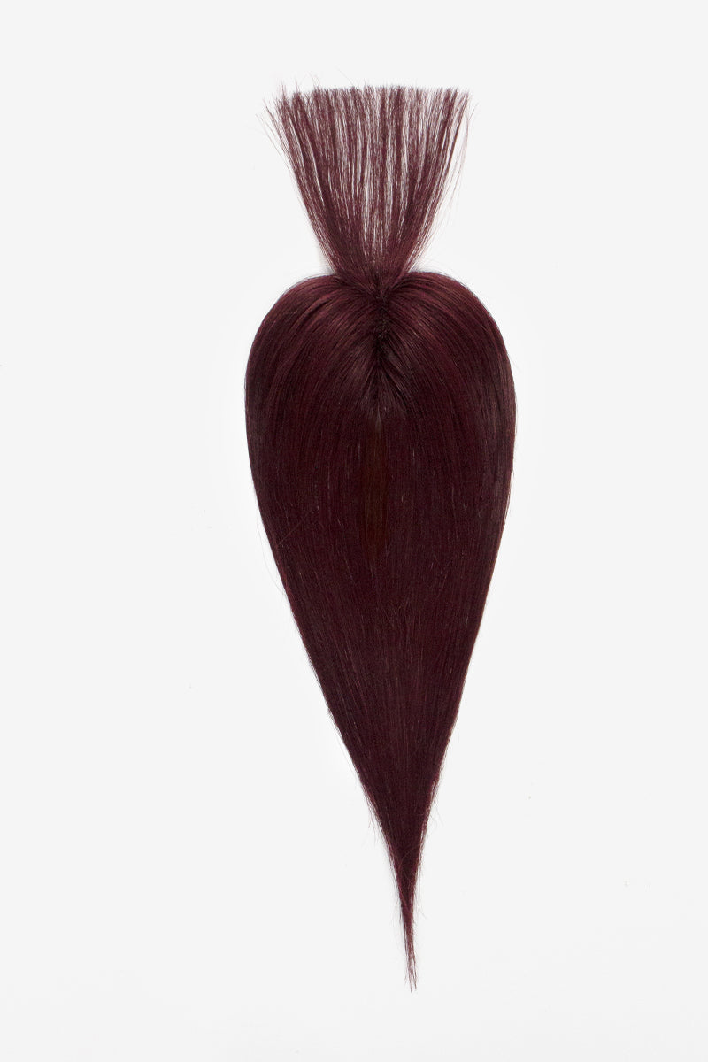 Burgundy hair topper on a white background