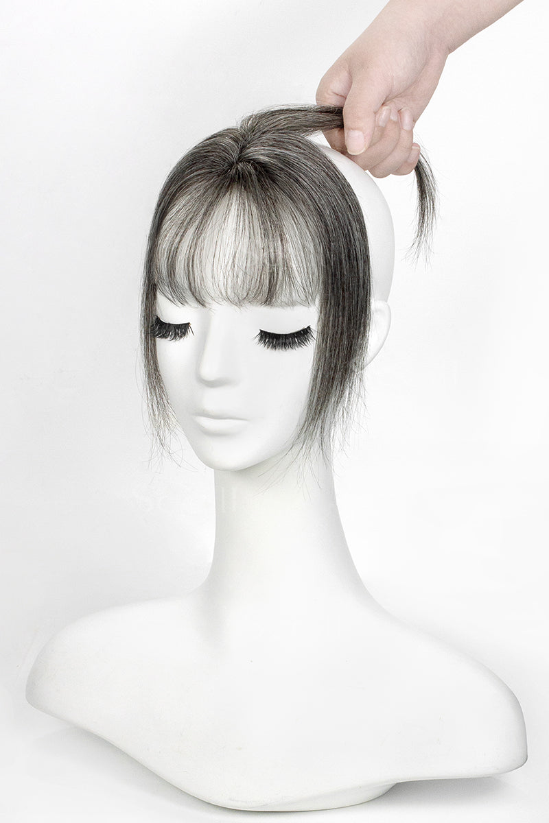 Mannequin head with a Magic Pixie Topper with Bangs 