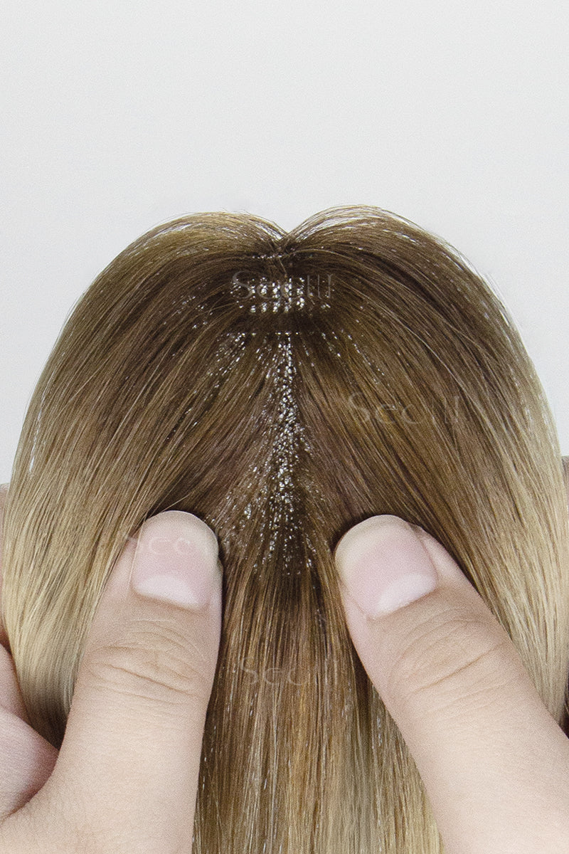 Close-up of Magic Pixie Topper with Bangs Light Blonde with Highlights 