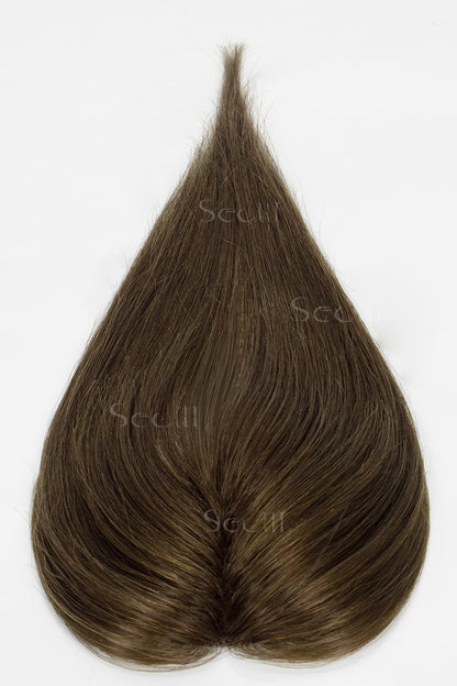 Brown hair topper on a white background