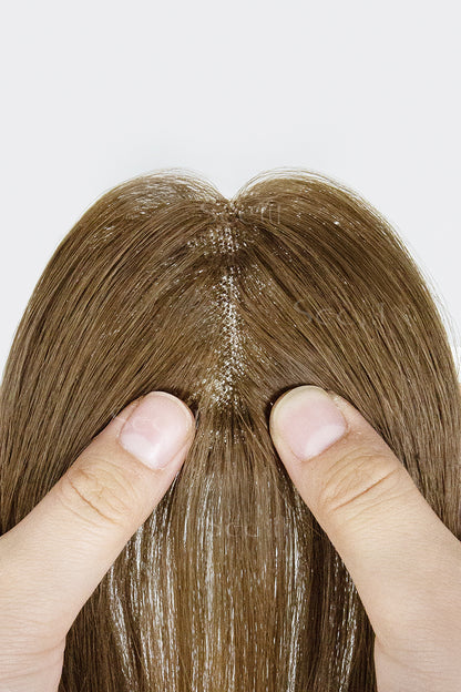 Close-up of a Magic Pixie Topper Medium Ash Brown 