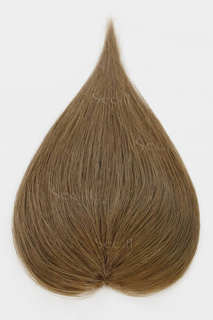 Hair color swatch in a teardrop shape on a white background