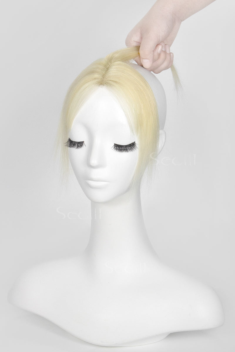 Mannequin head with Magic Pixie Topper Lightest Blonde 