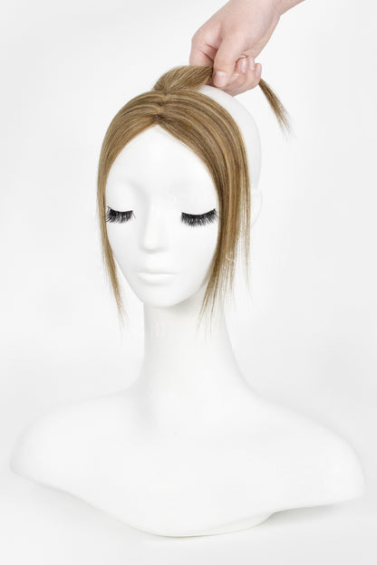 Mannequin head with a Magic Pixie Hair Topper Medium Brown with Warm Highlights 