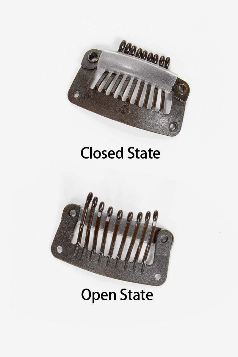 Metallic comb in closed and open states on a white background