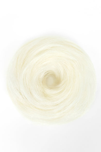White blonde hair scrunchie arranged in a circular bun shape on a white background.