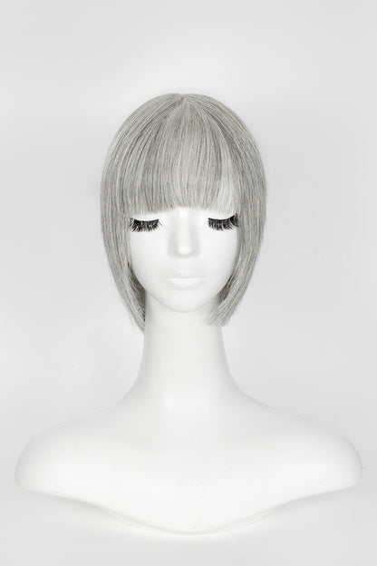 Short silver-gray wig side close-up view on mannequin head
