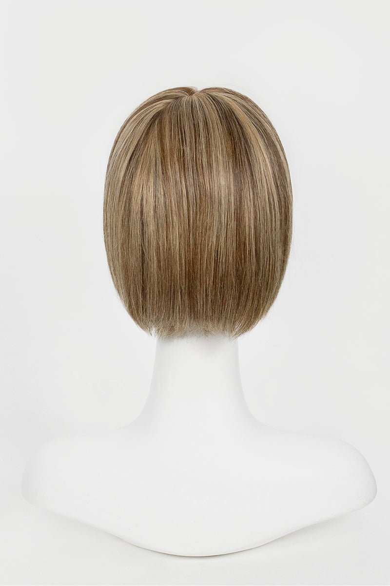 Brown bob wig on a mannequin head against a white background