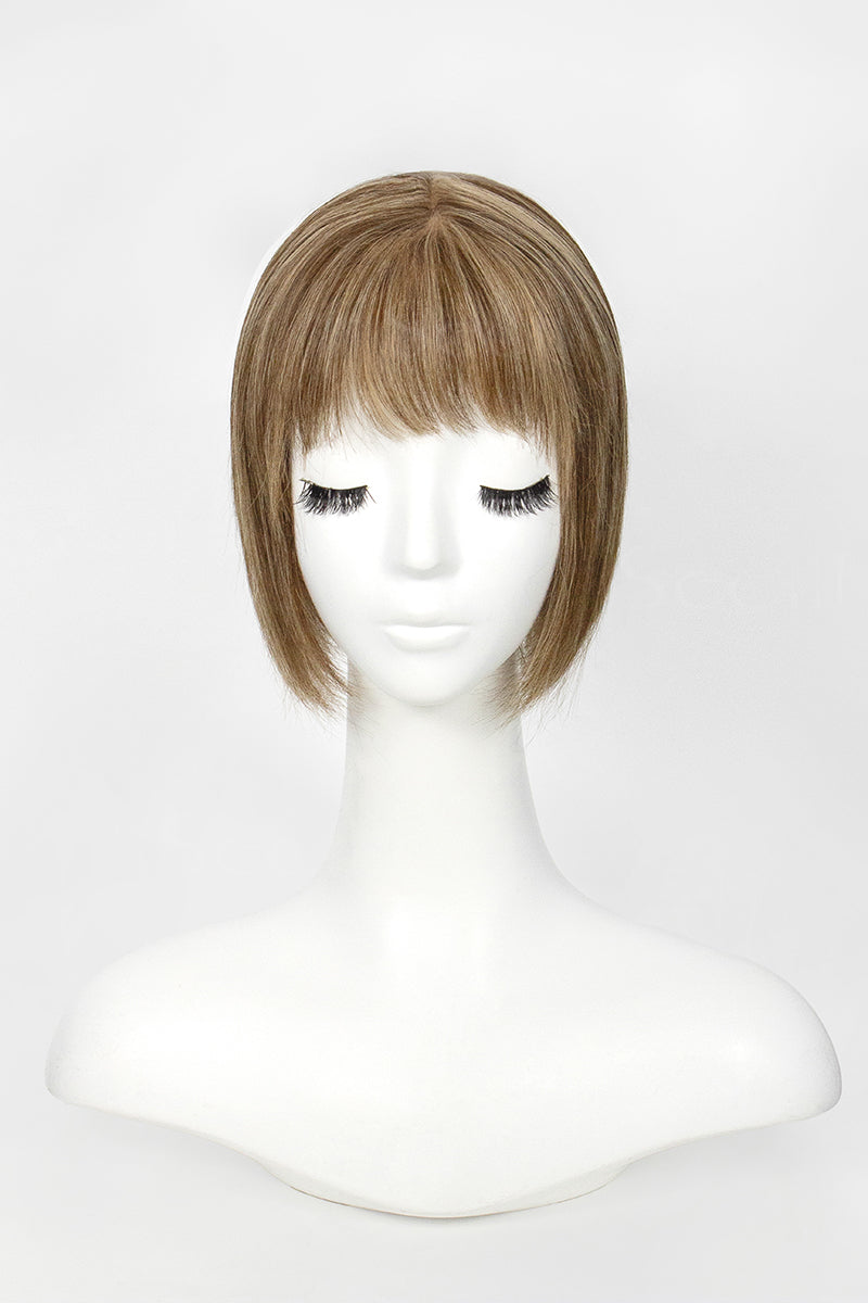 Mannequin head with a brown wig on a white background