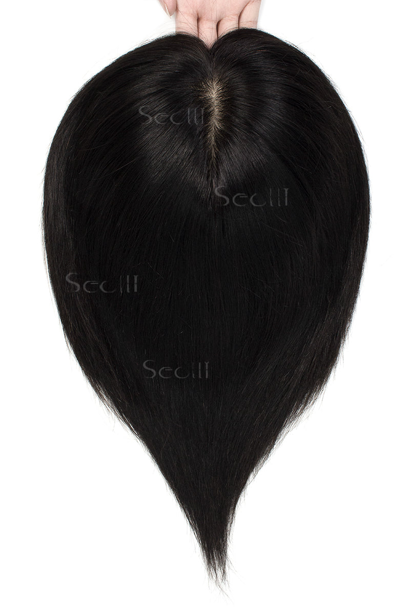 A human hair topper net, Carlin by Seully, displayed against a white background, showing a voluminous and natural hairline.