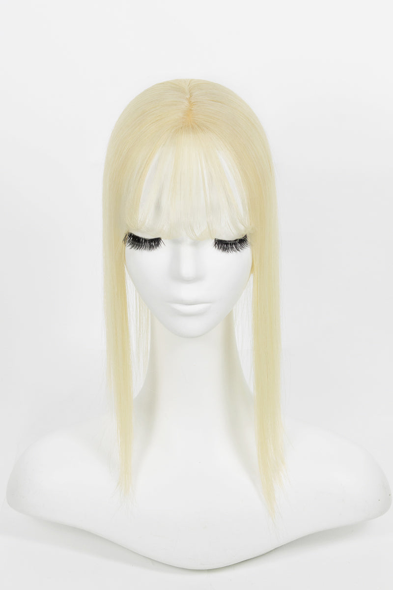 Hera Human Hair and Handmade Topper with Bangs on a mannequin head against a white background