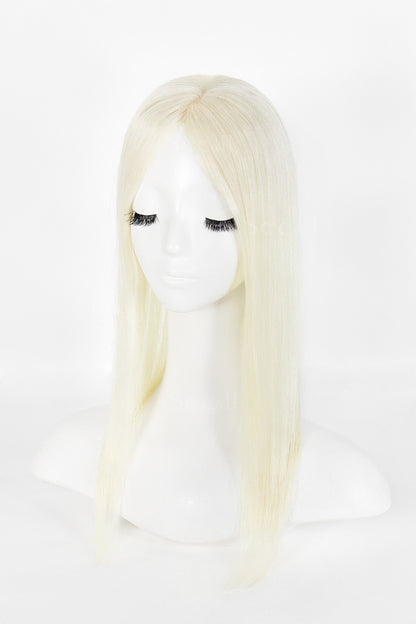 A long, straight platinum blonde wig displayed on a white mannequin head against a clean white background.